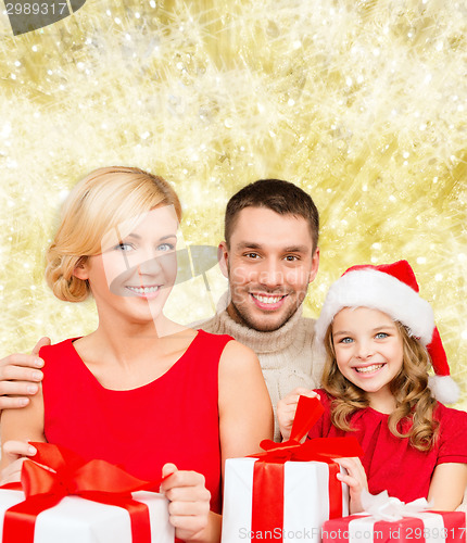 Image of happy family with gift boxes