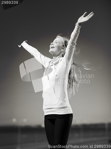 Image of woman doing sports outdoors