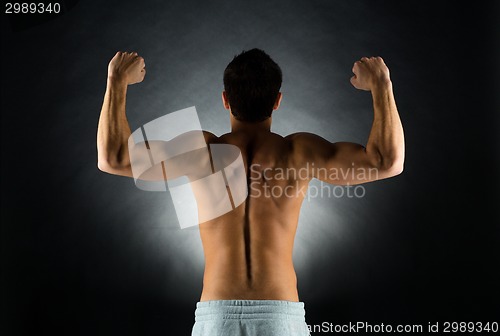 Image of young male bodybuilder from back