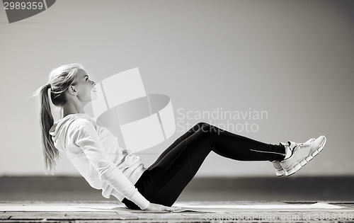 Image of woman doing sports outdoors