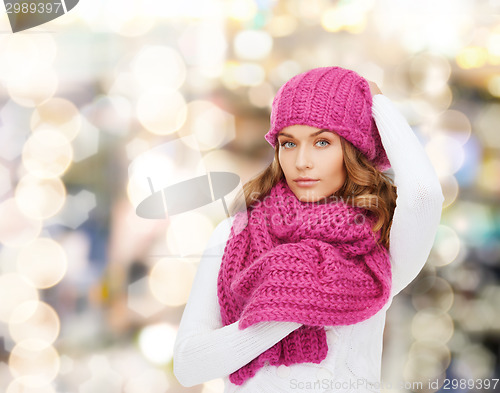 Image of smiling young woman in winter clothes