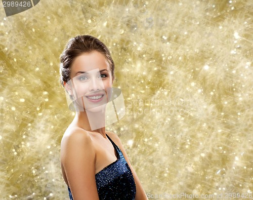 Image of smiling woman in evening dress