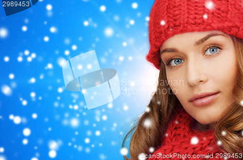Image of close up of young woman in winter clothes