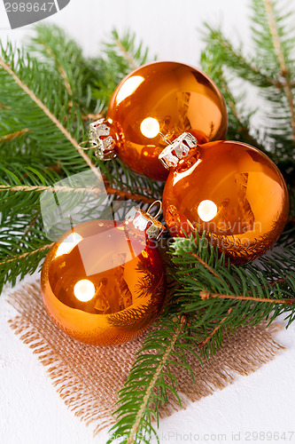 Image of Shiny bright copper colored Christmas balls