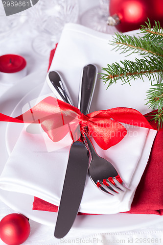 Image of Romantic red Christmas table setting