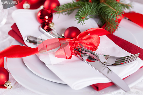 Image of Romantic red Christmas table setting