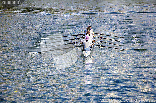 Image of Eight men rowing