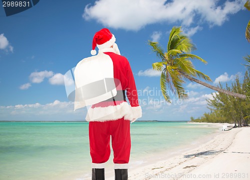 Image of man in costume of santa claus with bag