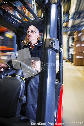 Image of driving a forklift