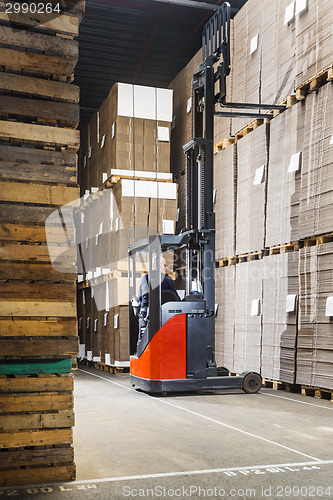 Image of Reach truck in a warehouse