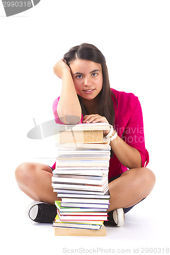 Image of Portrait of a girl teenager with her books on white 