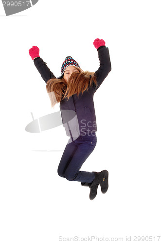 Image of Little girl jumping.
