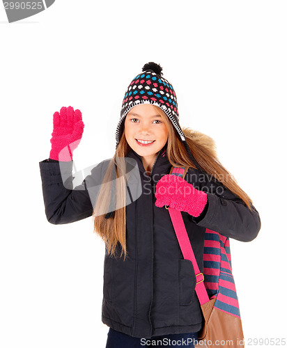 Image of Young girl waiving good by.