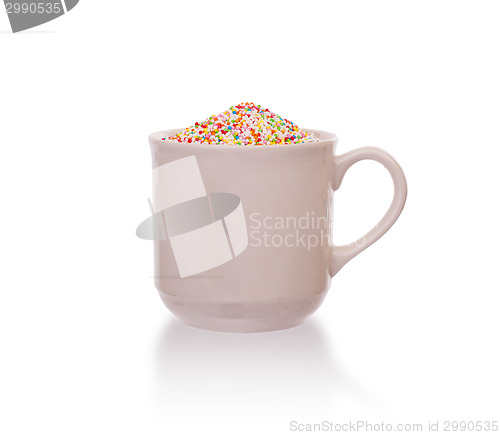 Image of Candy decorations in a white cup