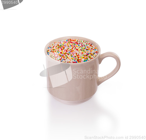 Image of Candy decorations in a white cup
