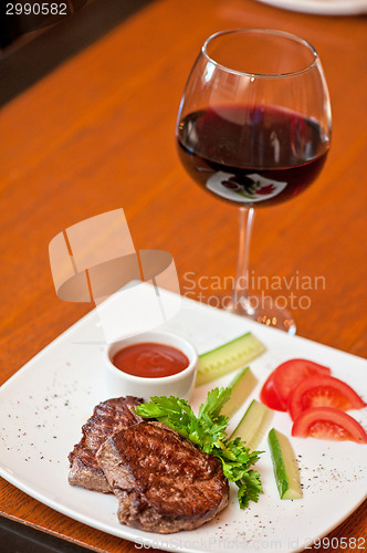 Image of beef meat and wine