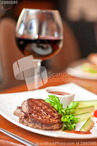 Image of beef meat and wine