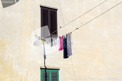 Image of Drying clothes on the wall