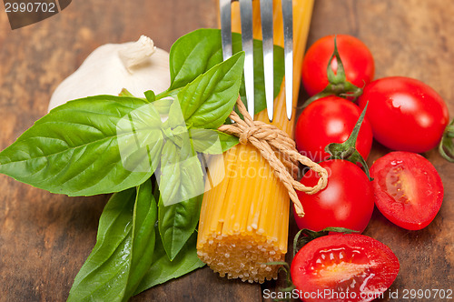 Image of Italian spaghetti pasta tomato and basil