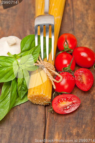 Image of Italian spaghetti pasta tomato and basil