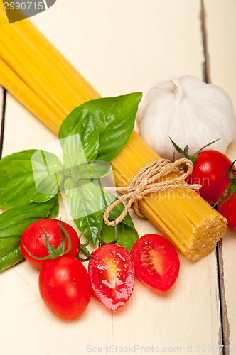 Image of Italian spaghetti pasta tomato and basil