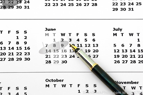 Image of Pen on calendar