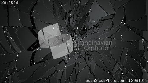 Image of Destructed and broken glass on black