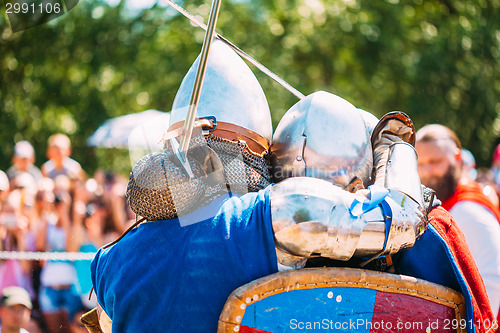 Image of Knights In Fight With Sword. Restoration Of Knightly Battle