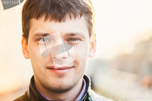 Image of Handsome Man Outdoors Portrait. Autumn Colors.