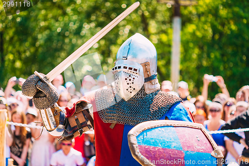 Image of Knight In Fight With Sword. Restoration Of Knightly Battle