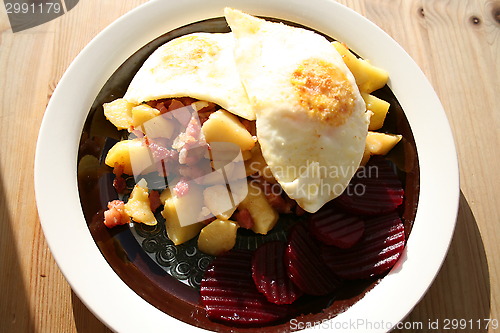 Image of Dish with bacon,egg,potato and beetroot