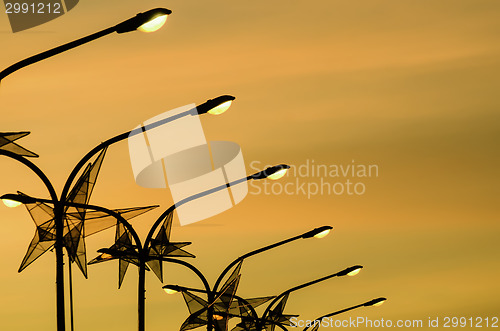 Image of Christmas Sunset Electric Posts