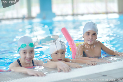 Image of children group  at swimming pool