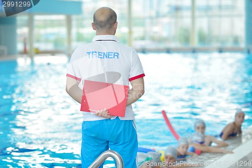 Image of children group  at swimming pool
