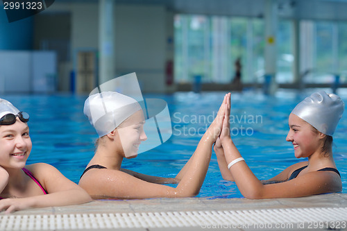 Image of children group  at swimming pool