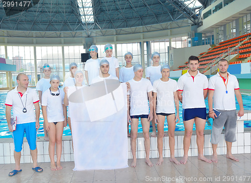 Image of children group  at swimming pool with empty white flag