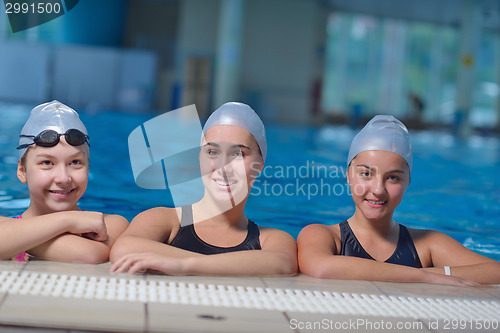 Image of children group  at swimming pool