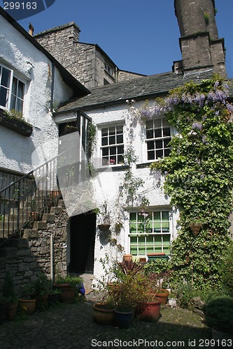 Image of cottage covered in ivy