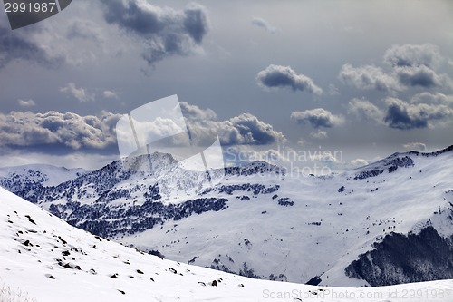 Image of Mountains in evening and cloudy sky