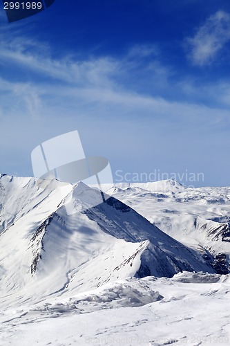 Image of Snowy mountains at sunny day