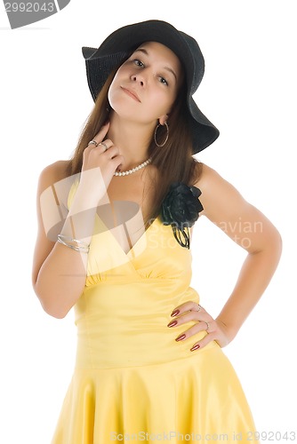 Image of Pretty woman in yellow dress
