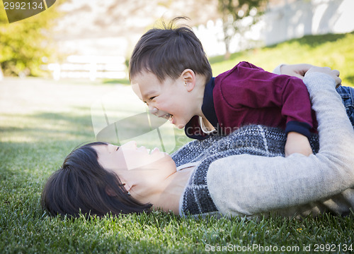 Image of Chinese Mother Having Fun with Her Mixed Race Baby Son