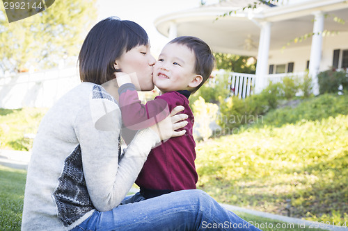 Image of Chinese Mother Having Fun with Her Mixed Race Baby Son