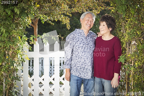 Image of Attractive Chinese Couple Enjoying Their House