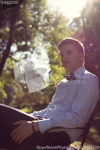 Image of Elegant young handsome groom. Fashion portrait.