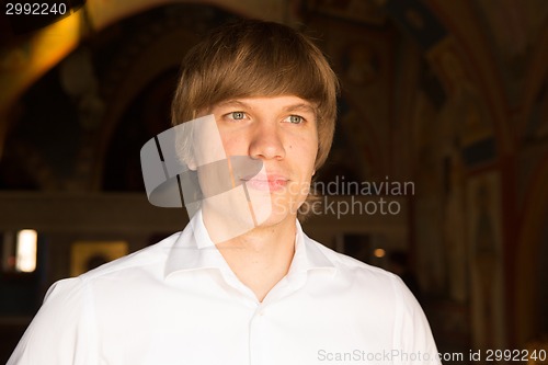 Image of Elegant young handsome groom. Fashion portrait.