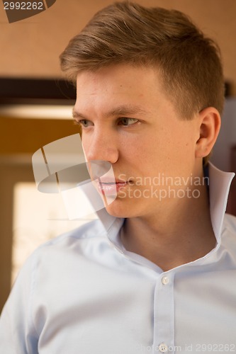 Image of Elegant young handsome groom. Fashion portrait.