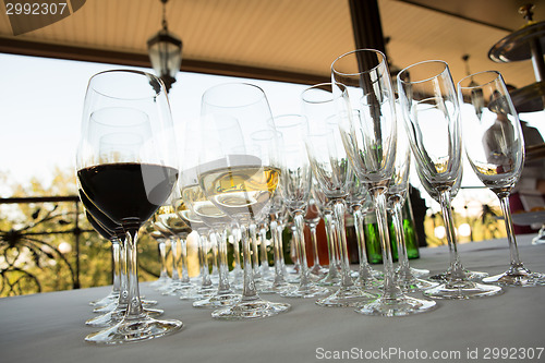 Image of glasses of wine at the bar