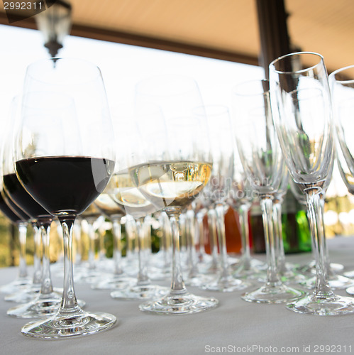 Image of glasses of wine at the bar