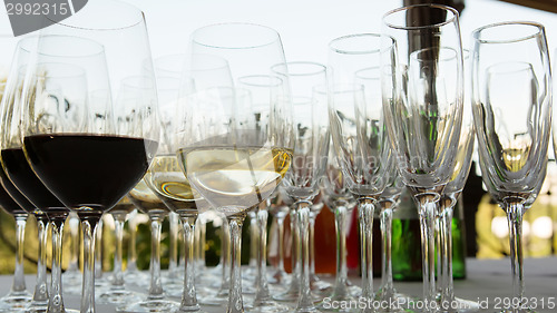 Image of glasses of wine at the bar